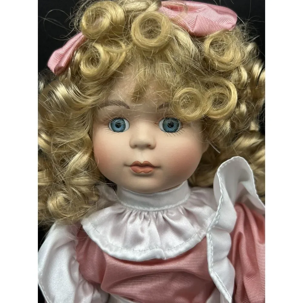 Collectible Porcelain Doll 16